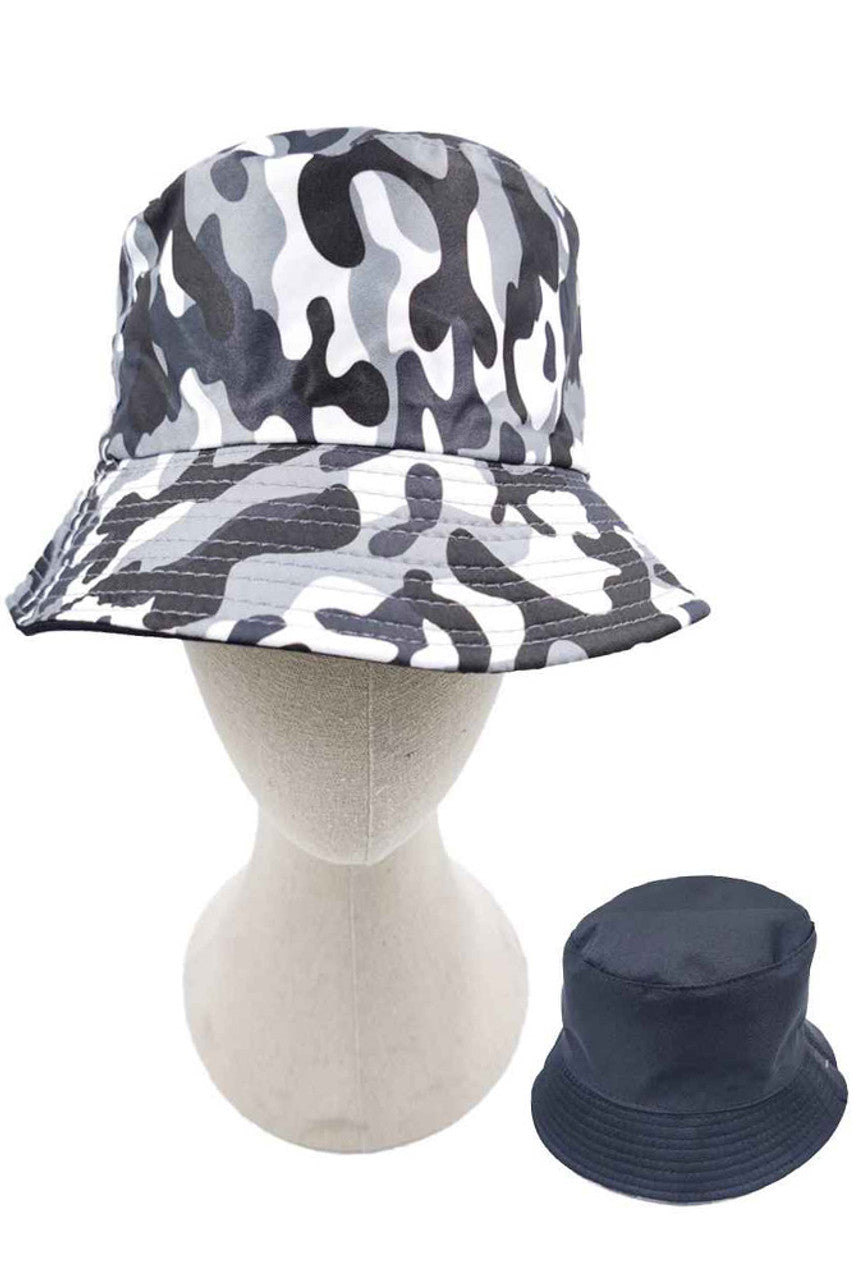 Gray CAMO PRINT REVERSIBLE BUCKET HAT features a versatile camo print design, allowing for two distinct styling options in one accessory. Constructed with durable materials to withstand outdoor elements while providing reliable sun protection. The classic bucket silhouette offers timeless appeal with functional versatility for both casual outings and outdoor activities. 