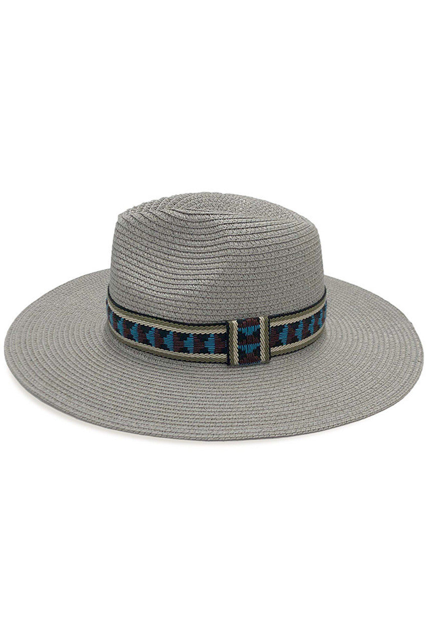 Gray Multi Color Aztec Band Panama Hat combines traditional weaving techniques with contemporary design elements. The distinctive Aztec pattern band showcases vibrant hues against the classic Panama silhouette, creating a statement accessory with ethnographic influence. The lightweight, breathable construction offers UPF protection while maintaining proper ventilation—ideal for discerning customers seeking both functionality and distinctive style in their summer headwear collection. 
