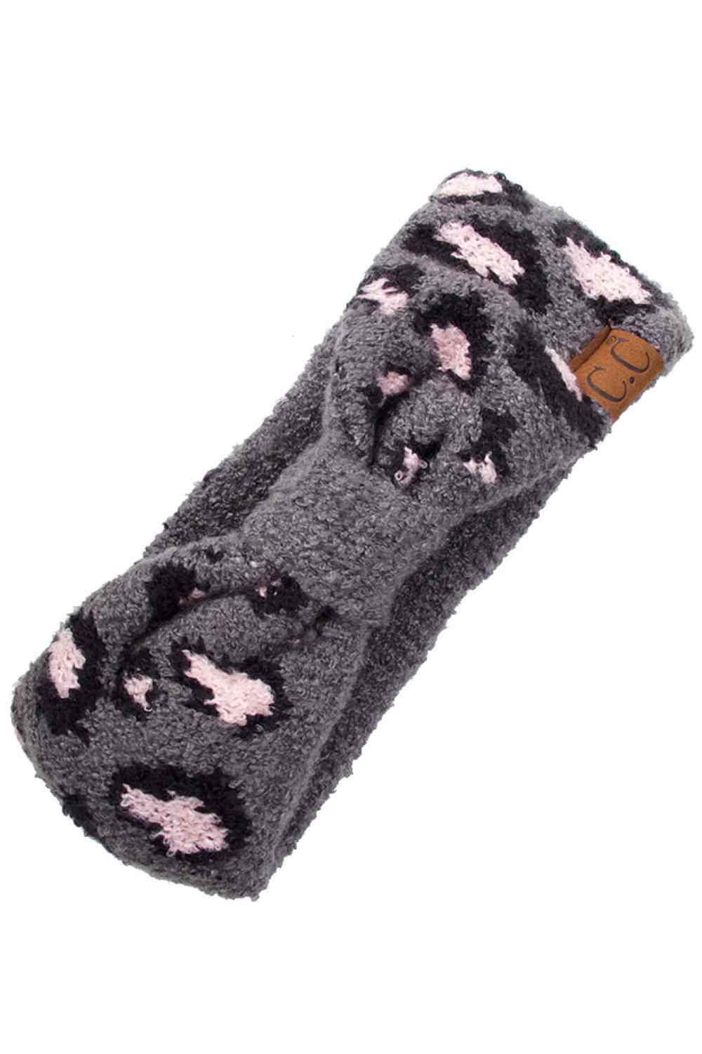 Gray Elevate your everyday style with the C.C Leopard Jacquard Knit Headwrap. Crafted from 100% acrylic, this versatile headwrap features a striking leopard jacquard pattern that adds dimension and visual interest. One size fits most, making it the perfect accessory for any occasion—whether you're running errands, hitting the gym, or making a fashion statement. Made in China with quality craftsmanship you can trust. Comfortable, durable, and effortlessly chic.