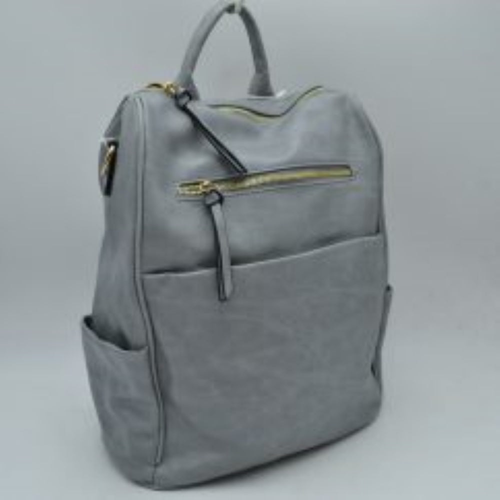 Gray This practical backpack features a textured, subtly grained exterior designed for organized everyday use. It provides multiple functional storage compartments, including a spacious main section accessed via curved top zippers, a horizontal front zippered pocket with an elongated pull tab, and a deep slip pocket underneath. A side open pouch offers additional quick-access storage along the lower edge. The design is completed by a sturdy top loop handle for convenient hand carrying