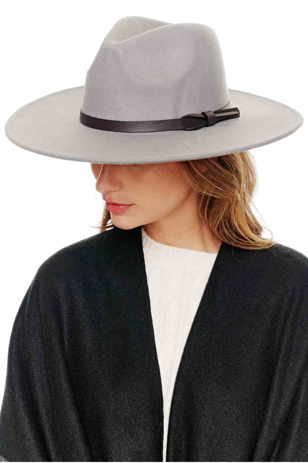 Gray Elevate your accessory game with this versatile Felt Wide Brim Fedora Hat. Constructed from 100% polyester, it delivers a luxuriously soft, suede-like feel that's both comfortable and durable. The wide brim and structured crown create a polished silhouette perfect for any occasion—from casual outings to dressed-up events.
