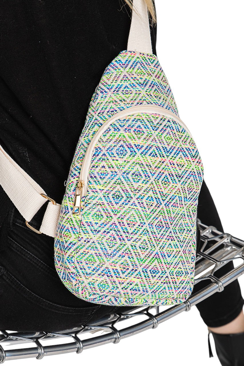 Green Aztec Pattern Sling Bag combines traditional design with modern functionality. Crafted with durable materials, it offers a spacious main compartment and adjustable strap for comfortable wear. Its distinctive Aztec pattern adds a unique, cultural touch, making it an ideal accessory for daily use or travel. This sling bag balances style and practicality, perfect for those seeking both aesthetic appeal and convenience.