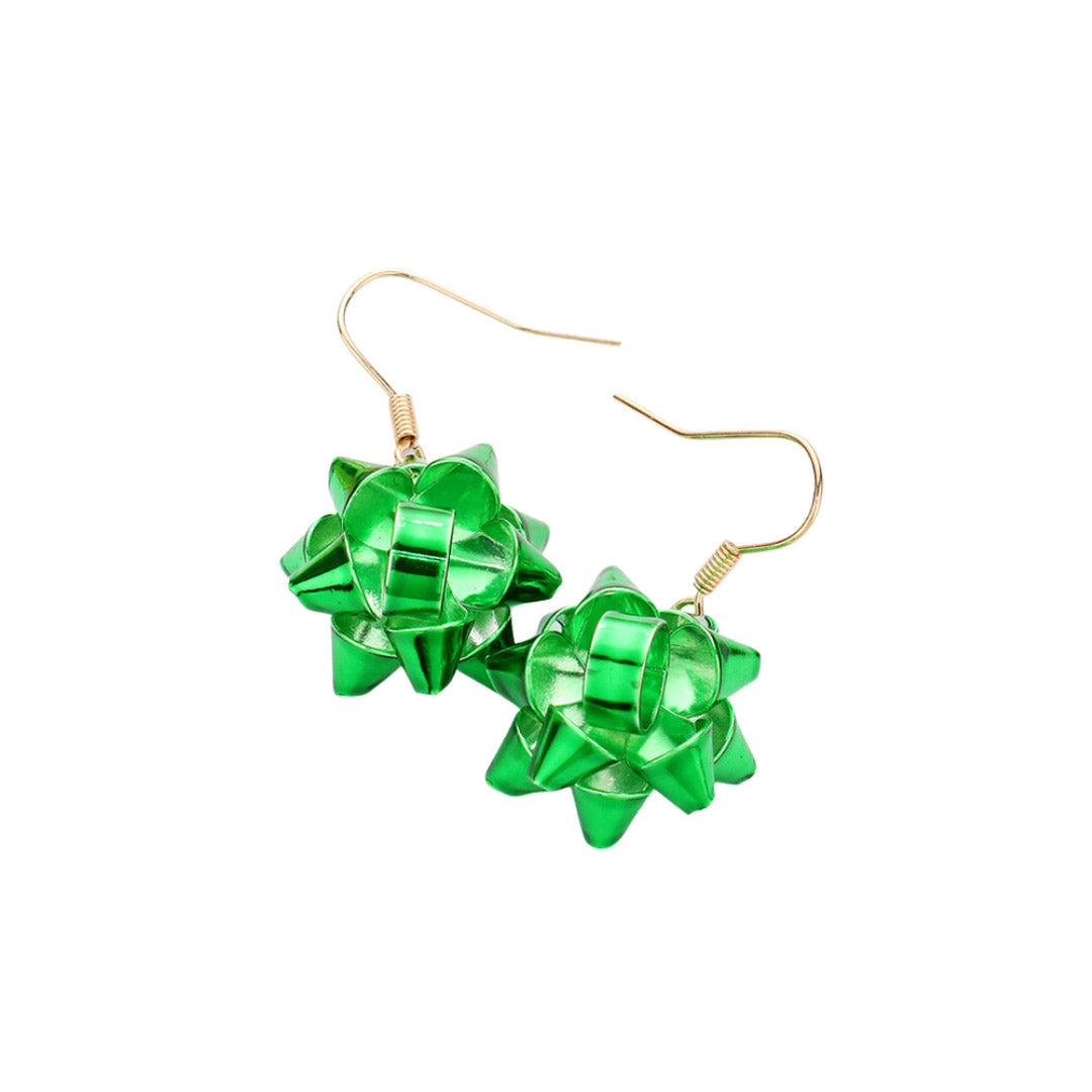 Green Beautiful Christmas Gift Bow Dangle Earrings, are beautifully designed with a bow theme that will make a glowing touch on everyone. These beautiful earrings are the ultimate representation of your class & beauty. These are the perfect gift for Christmas, especially for your friends, family, and the persons you love.