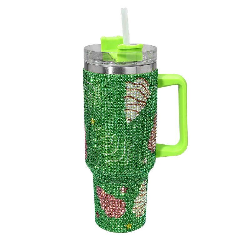Celebrate the holidays with this 40oz rhinestone tumbler featuring festive Christmas tree and ornament designs. Includes a handle and straw for easy sipping. A sparkling addition to your seasonal drinkware or gift list.