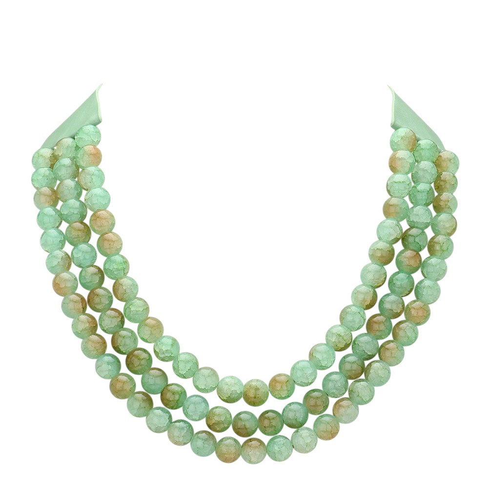 Green Chunky Metal Ball Beaded Triple Layered Faux Leather Magnetic Necklace is perfect for adding a touch of style and sophistication to any outfit. With its triple layered design and magnetic closure, it is not only fashionable but also easy to wear. The chunky metal ball beads add a unique touch to this faux leather necklace, making it a must-have accessory for any fashion-forward individual.