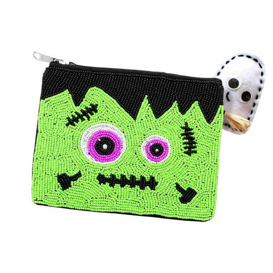 Green-Halloween Frankenstein Seed Beaded Mini Pouch Bag is a must-have for any festive occasion. Its eye-catching design features intricate seed bead work, depicting the iconic Frankenstein character. Perfect for storing small items, this mini pouch bag will add a touch of spookiness to your outfit.