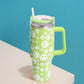 Green Happy Face Printed 40oz Stainless Steel Tumbler With Handle is perfect for keeping your drinks hot or cold for hours. Made of durable stainless steel and featuring a fun happy face print, this tumbler is a great addition to your drinkware collection. With its large 40oz capacity and convenient handle, you can enjoy your favorite beverages on the go while spreading joy and happiness.