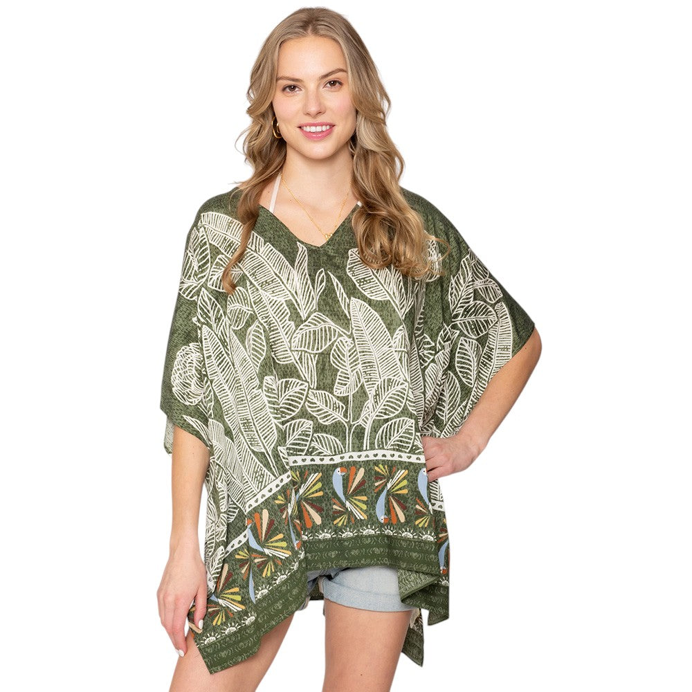 Green Leaf Print Cover Up Poncho is the perfect addition to your summer wardrobe. Made from lightweight fabric, it is both stylish and functional, providing coverage from the sun while keeping you cool. The leaf print adds a touch of nature-inspired elegance to any beach or pool ensemble. 