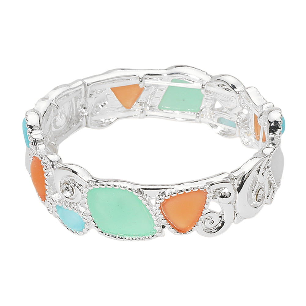 Green Silver Sea Glass Pebble Stretch Bracelet is expertly crafted with genuine sea glass pebbles for a unique and natural look. The stretch design ensures a comfortable and secure fit. Elevate your style with this one-of-a-kind piece of jewelry.