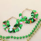 Green St Patrick's Day Sequin Dangle Hoop Earrings make the perfect accessory for your holiday outfit. The shimmering sequins and dangling hoops add a touch of festive elegance. With a lightweight design and secure clasp, they can be worn comfortably all day long. Show off your Irish pride in style. 