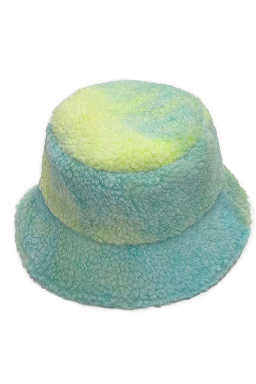 Green Tie Dye Teddy Bucket Hat combines playful aesthetics with practical sun protection. Each hat features a unique tie-dye pattern and adorable teddy bear embellishment, creating a statement accessory that elevates casual outfits. Constructed with quality materials for durability and comfort during extended wear.