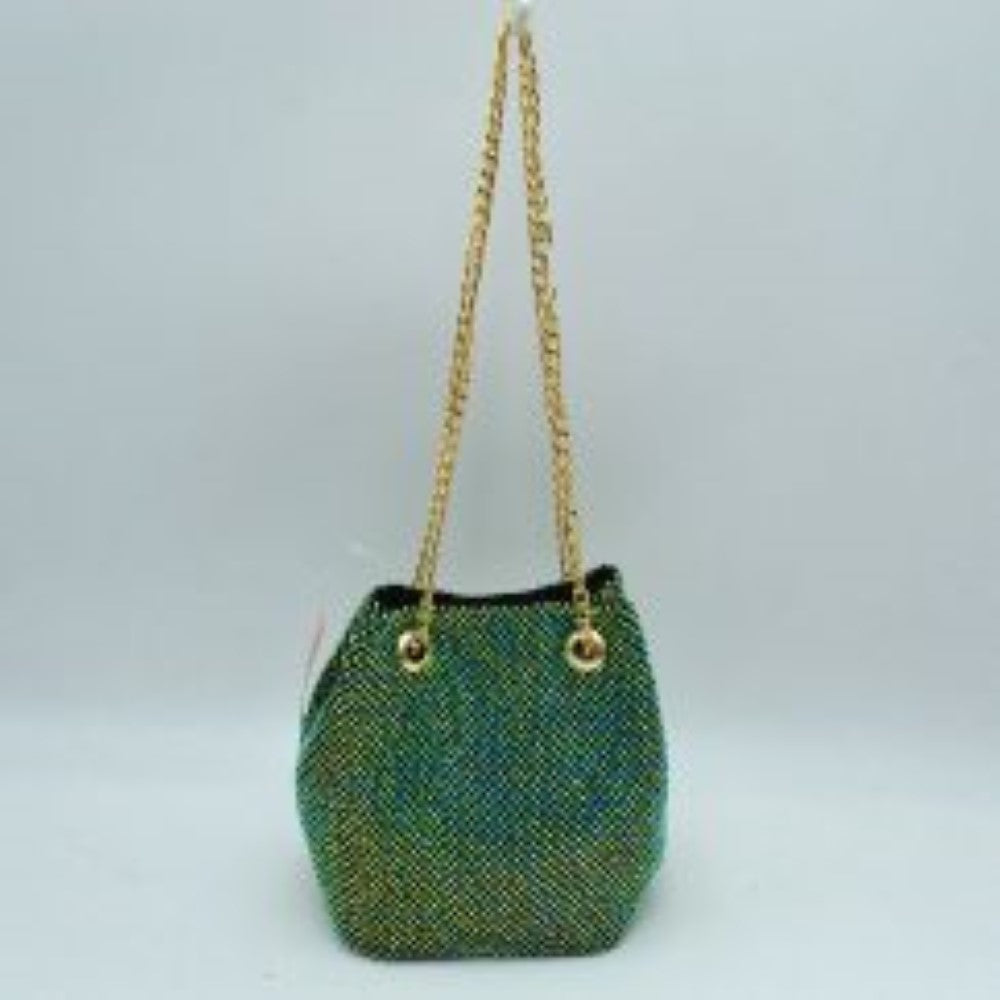 Green This bucket bag features a shimmering, textured mesh exterior ideal for everyday use and evening transitions. The main storage compartment is designed with a gathered top entry that opens up for effortless access to your items. Two matching metallic link chain straps pull through circular metal grommets on the front and back, serving as a functional drawstring mechanism while doubling as a comfortable shoulder carry style.