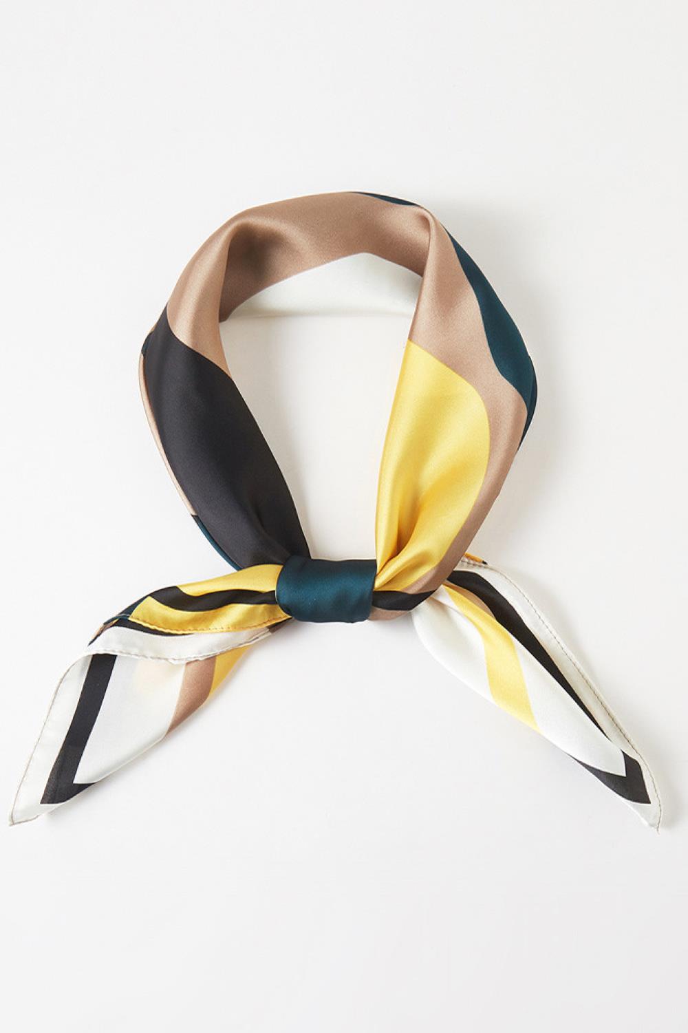 Green Elevate your summer style with this versatile geometric pattern print bandana scarf. Crafted from lightweight 100% polyester, it's perfect for hot weather wear while maintaining breathability and comfort. The generous 27.5" x 27.5" square size offers endless styling possibilities wear it as a headscarf, neck wrap, or accessory to any outfit. Its vibrant geometric design adds a modern, eye-catching touch to casual or dressed-up looks. Ideal for travel, outdoor activities, or everyday wear, this durable