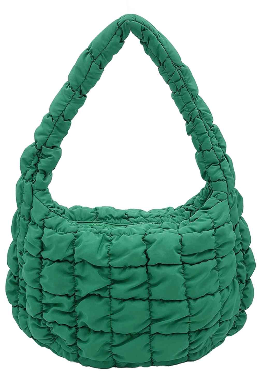 Green Compact quilted bag crafted from durable 100% polyester with a timeless solid design. Measuring 8.7" x 11.8" x 3.15", it's the perfect size for everyday essentials, travel accessories, or as a versatile organizer. The quilted texture adds visual interest and subtle structure. Ideal for on-the-go convenience with a sleek, minimalist aesthetic that pairs effortlessly with any outfit.