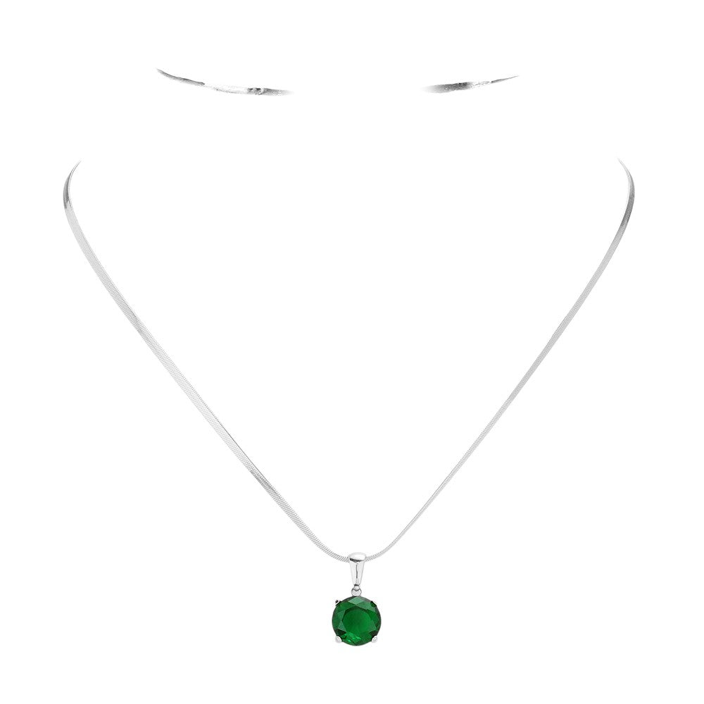 Green Stainless Steel CZ Round Pendant Necklace is a stylish and durable accessory. Crafted from high-quality stainless steel, this necklace is resistant to tarnishing and fading. Featuring a sparkling CZ round pendant, it adds a touch of elegance to any outfit. Upgrade your jewelry collection with this timeless piece. 