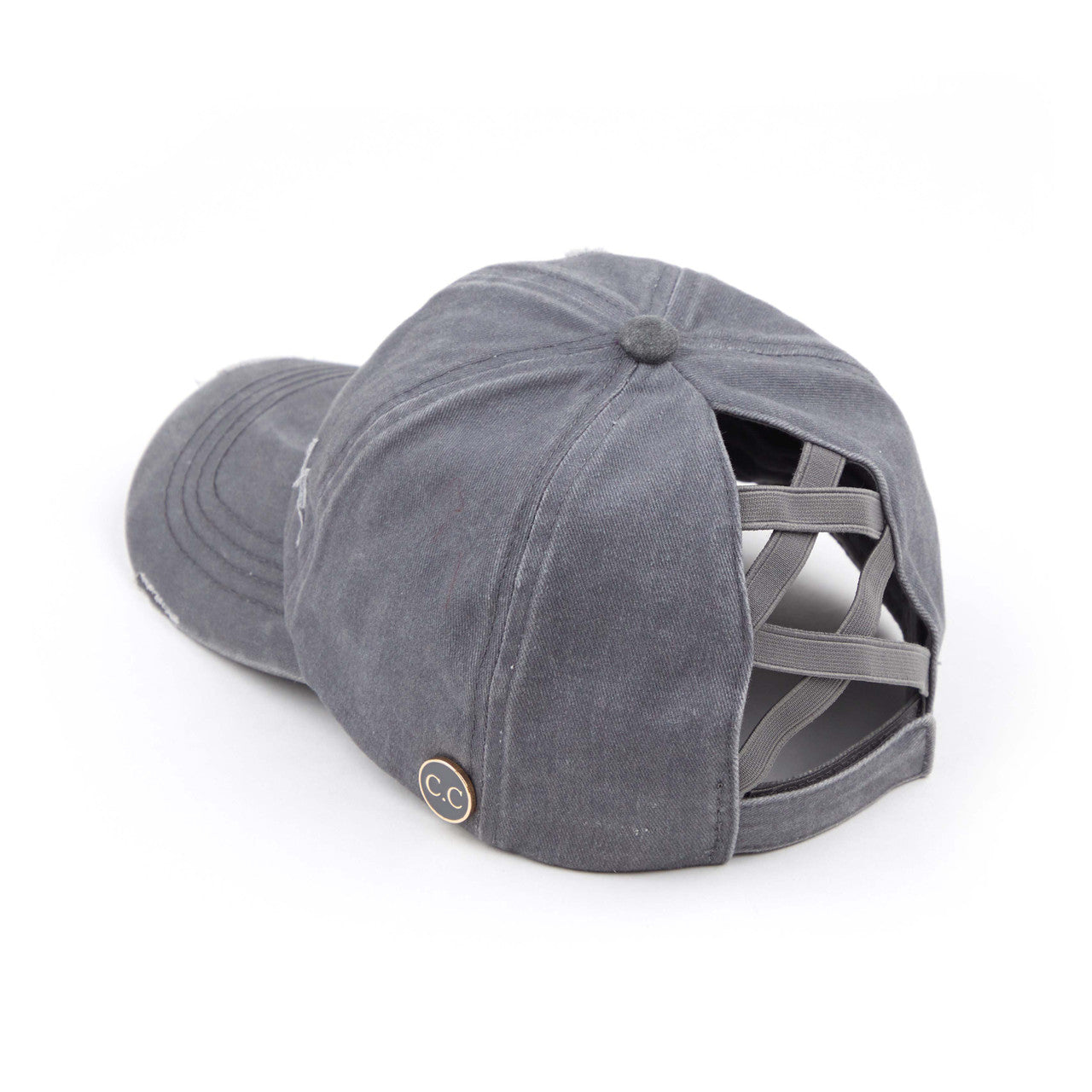 Grey C.C BASEBALL PONYCAP is the perfect accessory for any sports enthusiast. Made with high-quality materials, this cap offers both style and functionality. With its comfortable fit and sleek design, it will keep you looking and feeling cool while you support your favorite team. Upgrade your game day look with the C.C BASEBALL PONYCAP.