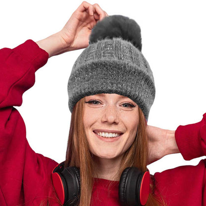 Grey Fleece Lining Pom Pom Beanie Hat, is perfect for chilly days. This stylish hat is sure to keep you warm and comfortable during the cold. Whether you're headed out for a walk or just spending time outdoors, this fashionable beanie is a great accessory. A perfect gift choice for your close people in the winter season. 