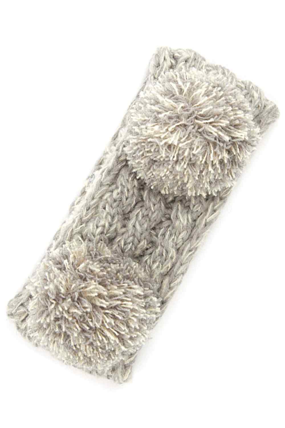 Grey Cozy two-tone kids head wrap featuring a soft fuzzy lining for extra warmth and comfort. Double pom-pom design adds playful style perfect for cold weather. Crafted from 100% acrylic for durability and easy care. One size fits most children. A practical accessory that keeps little ones warm while looking adorable.