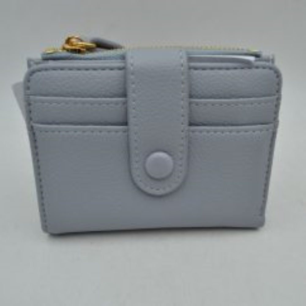 Grey This compact card holder wallet features a textured pebbled exterior in a soft beige tone, providing a sleek and practical design for daily organization. The front panel is equipped with multiple exterior card slots secured by a matching leather strap with a snap button closure. A secure side pocket with a metallic gold-tone zipper and a detailed leather pull tab opens to an internal compartment for coins or folded bills, making it an essential companion for minimalist carrying.