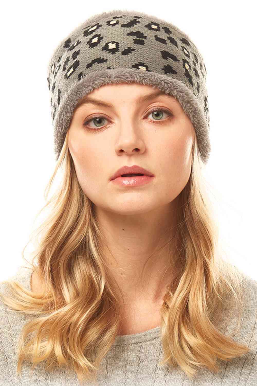 Grey Stay stylish with this eye-catching Leopard Print Headband. Crafted from a comfortable blend of 50% polyester and 50% acrylic, this versatile accessory measures 4" x 10" and fits one size. Perfect for keeping hair in place while adding a bold fashion statement to any outfit. Whether you're heading to the gym, running errands, or just want an instant style upgrade, this headband delivers both function and flair.