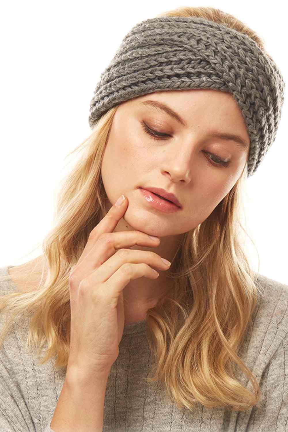 Grey Stay warm and stylish with this Solid Twisted Knit Headband. Crafted from soft 100% acrylic, it features a classic twisted knit design that adds texture and visual interest. The generous 4" x 9.8" dimensions provide comfortable coverage for your ears and forehead. Perfect for chilly days, outdoor activities, or casual everyday wear. Lightweight and easy to care for, this versatile headband pairs effortlessly with any winter wardrobe.