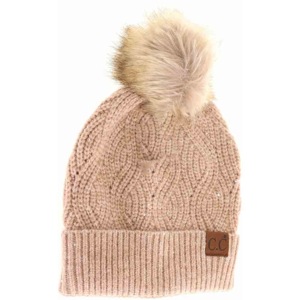 HeatherSand Sequin Brioche Cable Knit Fur Pom C.C Beanie combines classic craftsmanship with a modern touch. Featuring a soft brioche cable knit pattern enhanced by subtle sequins, this beanie adds understated sparkle to cold-weather style. The plush fur pom enhances warmth and a refined aesthetic, making it an ideal accessory for both functionality and fashion during chilly days. Durable and comfortable, it delivers expert-level design that complements any winter wardrobe. 