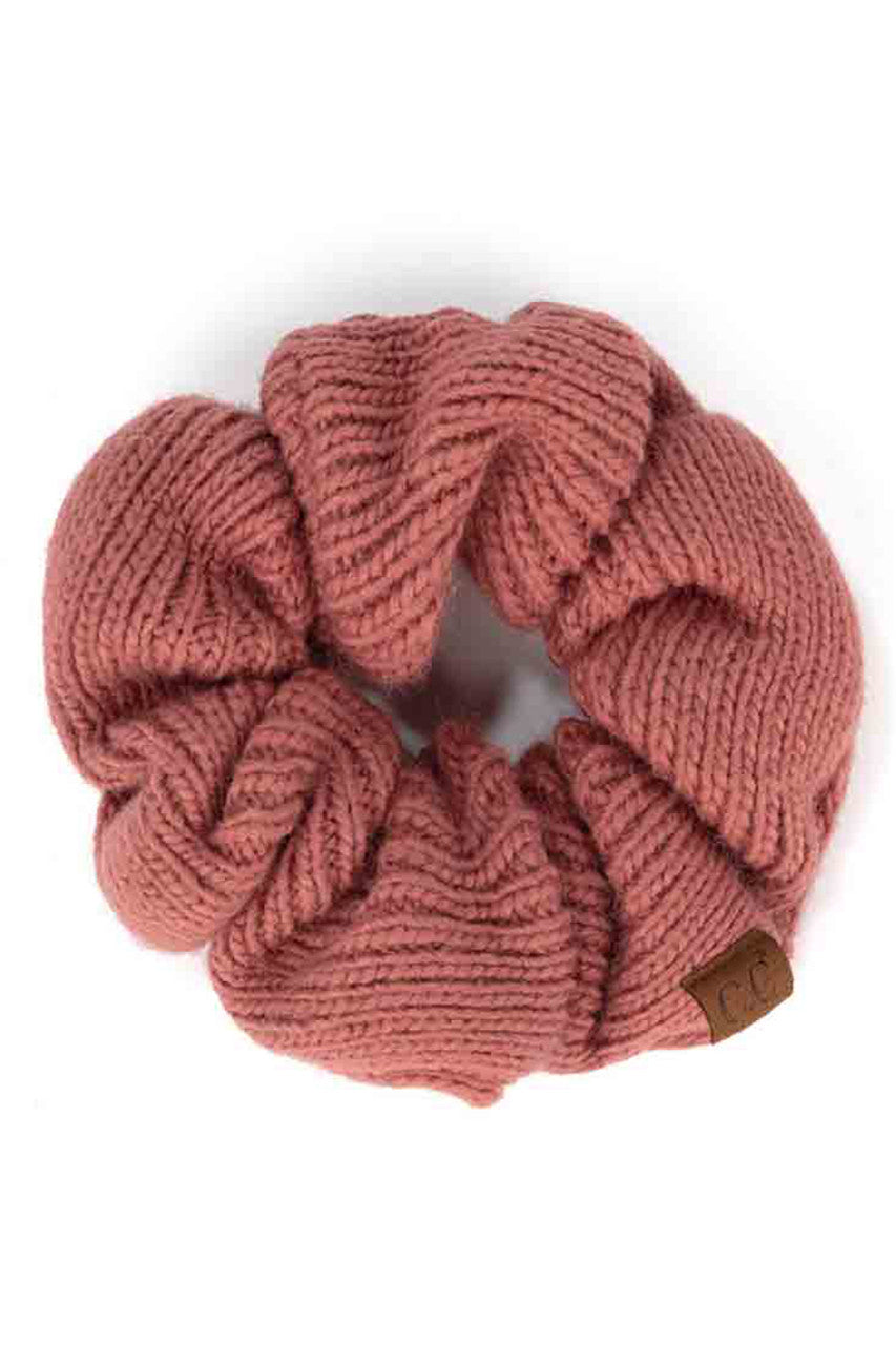 Hot Pink C.C. Soft Knit Scrunchies provide a stylish and comfortable way to keep your hair in place without causing damage. Made with soft knit material, they are gentle on your hair and perfect for everyday wear. Their scrunchy design also adds a trendy touch to your hairstyle