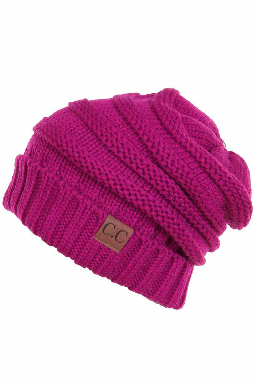 Hot Pink Wrap yourself in warmth with this C.C Slouchy Knitted Beanie, crafted from 100% soft acrylic for ultimate comfort. The oversized silhouette and plush pom pom detail create a relaxed, on-trend look perfect for chilly days. Available in nine versatile colors—Beige, Berry, Dark Denim, Heather Gray, Ivory, Pistachio, Rose, Steel Blue, and Violet Purple—this beanie pairs effortlessly with any winter wardrobe. The ribbed knit construction ensures durability and a flattering fit. Hand wash and lay flat to