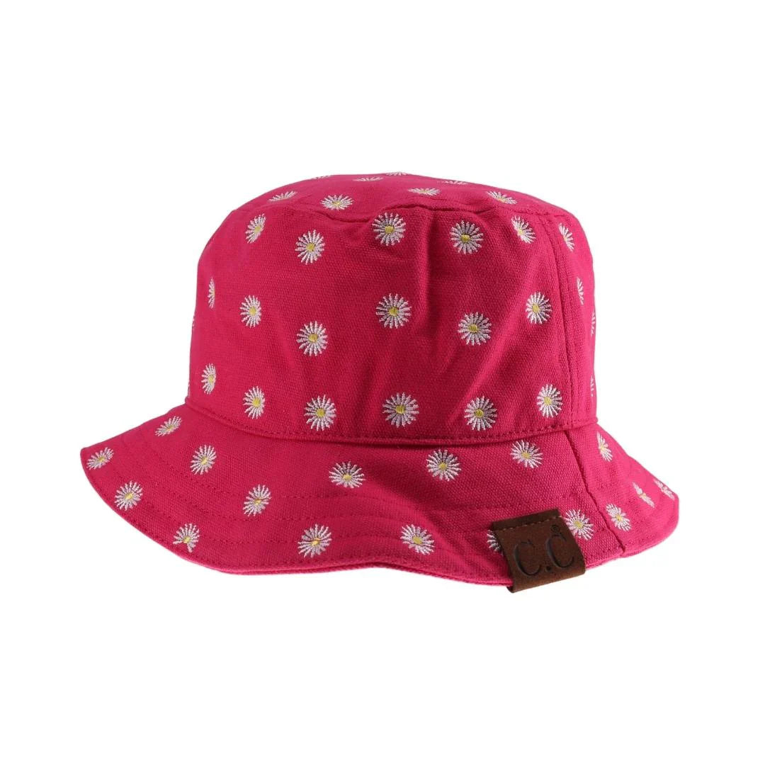 Hot Pink C.C Daisy Embroidered Cotton Canvas Bucket Hat is made with high-quality, durable materials. Hand-stitched with a vibrant daisy design, it offers both style and protection from the sun. The comfortable and breathable cotton canvas makes it perfect for any outdoor activity.