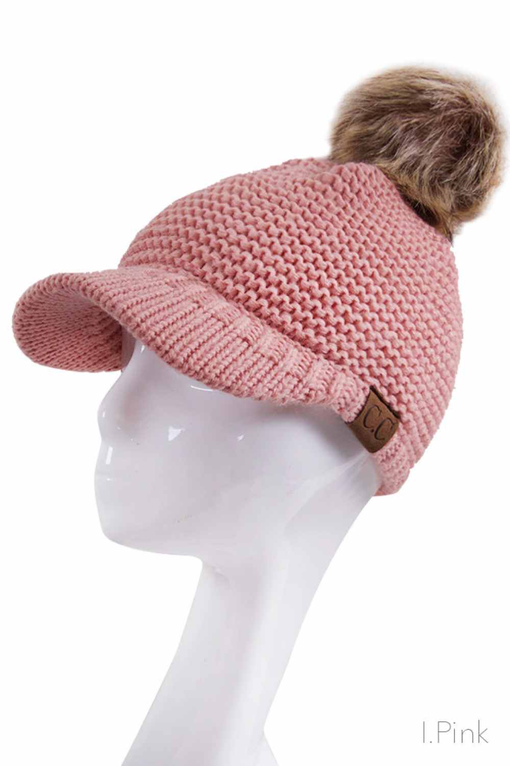 Indi Pink Elevate your winter wardrobe with this versatile C.C knit brim beanie, crafted from 100% soft acrylic for exceptional comfort and durability. The signature knitted brim design pairs beautifully with a plush fur pom pom, adding a touch of sophistication to any cold-weather look. One size fits most, making it an effortless accessory choice for anyone seeking warmth without compromising on style. Perfect for layering or standalone wear, this beanie delivers both functionality and fashion