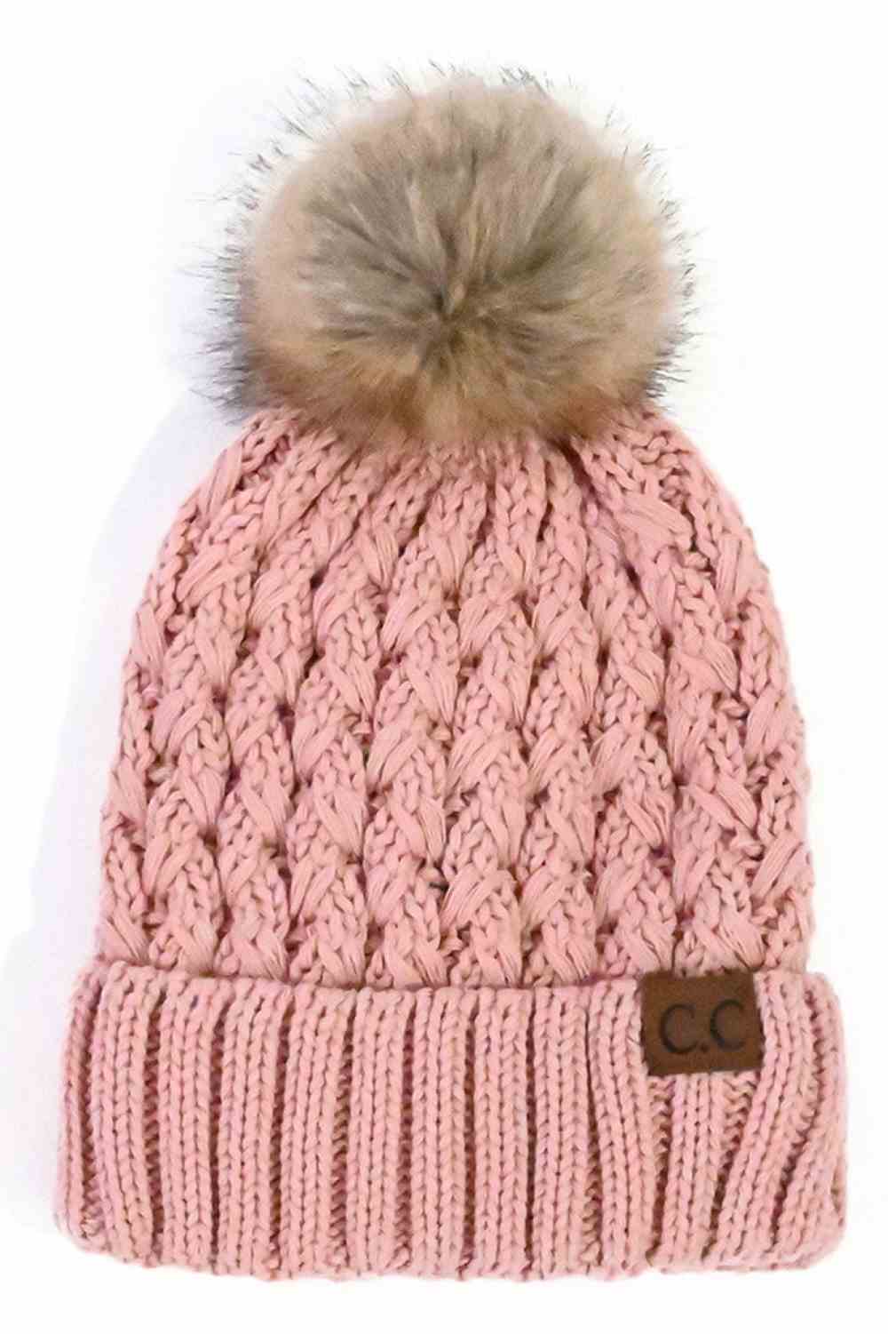 Pink Elevate your winter wardrobe with the C.C Lattice Crossover Stitch Beanie, featuring an intricate lattice pattern and cozy pom detail. Crafted from 100% soft acrylic, this beanie delivers warmth and comfort without the weight. The crossover stitch design adds visual interest while the relaxed fit suits most face shapes. Perfect for layering over your favorite winter looks, this versatile beanie transitions effortlessly from casual outings to outdoor adventures. One size fits most for easy, everyday wea