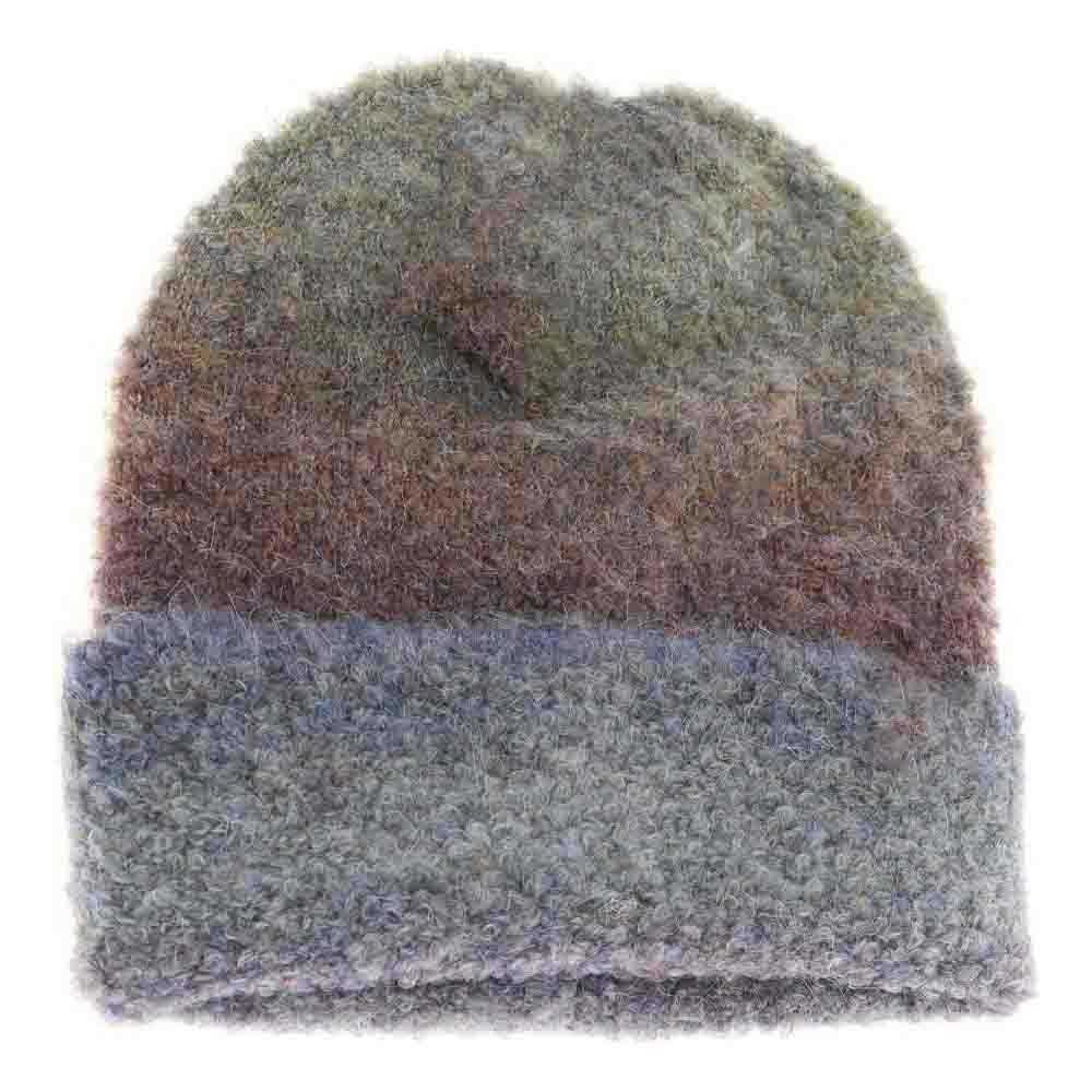 IndigoBlueMix Multi-colored Slouchy Mohair Cuffed C.C Beanie combines the softness of mohair with a stylish, relaxed fit. Its vibrant multi-colored design adds a modern touch, while the cuffed edge ensures a secure and comfortable wear. Perfect for cooler weather, this beanie offers lightweight warmth without bulk, making it an ideal accessory for both casual outings and urban layering. Crafted for durability and style, it’s a versatile choice for those who appreciate quality knitwear.
