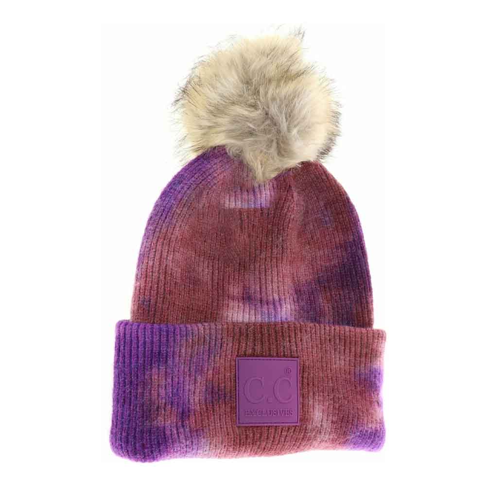 Iris-WildGingeTie Dye Fur Pom C.C Beanie seamlessly combines vibrant design with functional warmth. Expertly crafted, it features a unique tie-dye pattern and a luxurious fur pom that adds both texture and flair. Made from soft, stretchable materials, this beanie offers a comfortable, secure fit suitable for various head sizes. Ideal for cold weather, it elevates any winter wardrobe with its blend of fashion-forward style and practical insulation. 