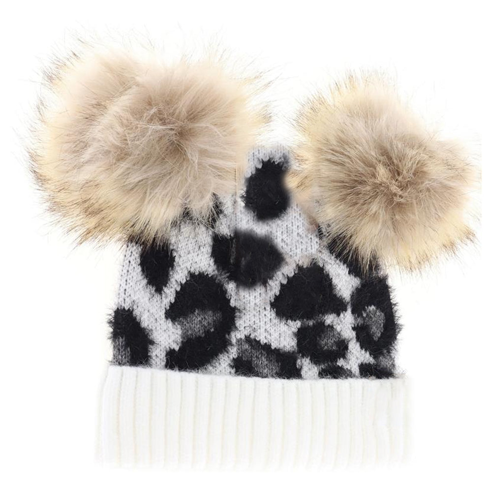 Ivory BABY Leopard Double Pom C.C Beanie combines playful style with cozy warmth, featuring a soft knit design adorned with cute leopard print and two fluffy pom-poms. Crafted for comfort and durability, it provides gentle insulation for delicate heads while adding an adorable touch to any baby’s outfit. Ideal for chilly days, this beanie keeps your little one snug and stylish with expert-crafted quality. 