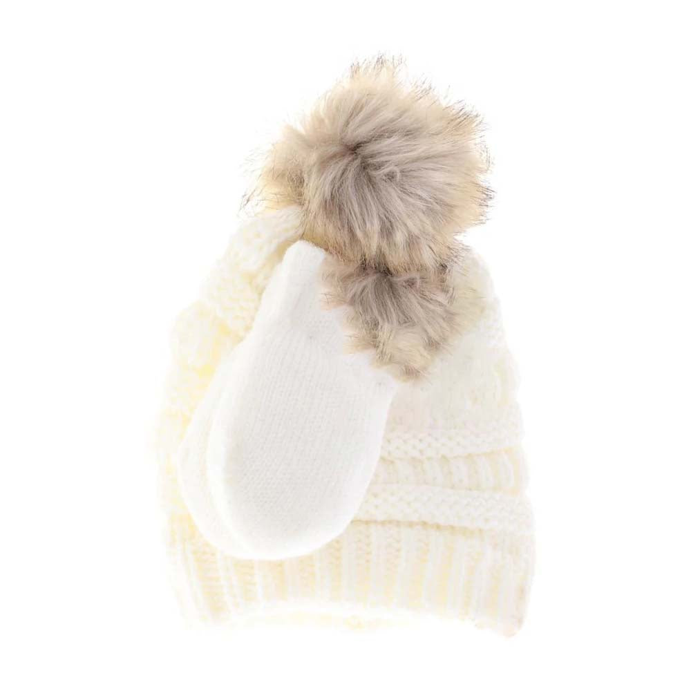 Ivory BABY Solid Knit Faux Fur Pom C.C Beanie with Mitten Set combines warmth and style for your infant. Featuring a soft knit construction and a plush faux fur pom, the beanie offers gentle insulation while the coordinating mittens keep tiny hands protected from chilly weather. This set is designed with comfort and durability in mind, providing reliable cold-weather coverage that is both functional and fashionable for everyday use.