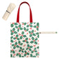 Reusable Christmas tote bag featuring a festive holly and berry print. Ideal for holiday shopping, gifting, or seasonal outings. Durable and stylish, it's a cheerful addition to your holiday essentials.
