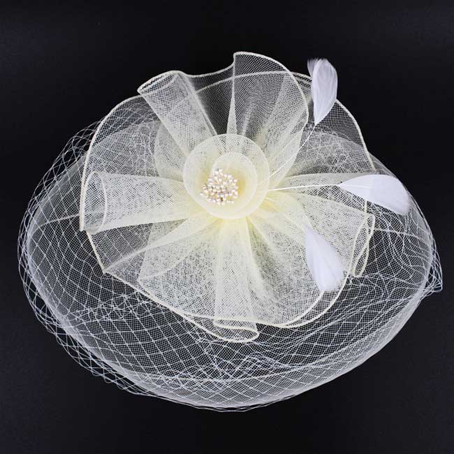 Ivory Feather Mesh Flower Fascinator Headband, with its luxurious yet lightweight composition. Crafted with high-quality materials, the headband features a feather mesh flower, making it the perfect accessory for any outfit. The headband adds a touch of sophistication. Perfect gift choice for loved ones on any day.