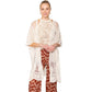 Ivory Flower Lace Kimono Poncho is a versatile and fashionable addition to any wardrobe. The delicate lace detailing adds a touch of elegance, while the kimono style allows for comfortable and easy wear. Perfect for dressing up any outfit, this poncho is a must-have for any fashion-forward individual. 