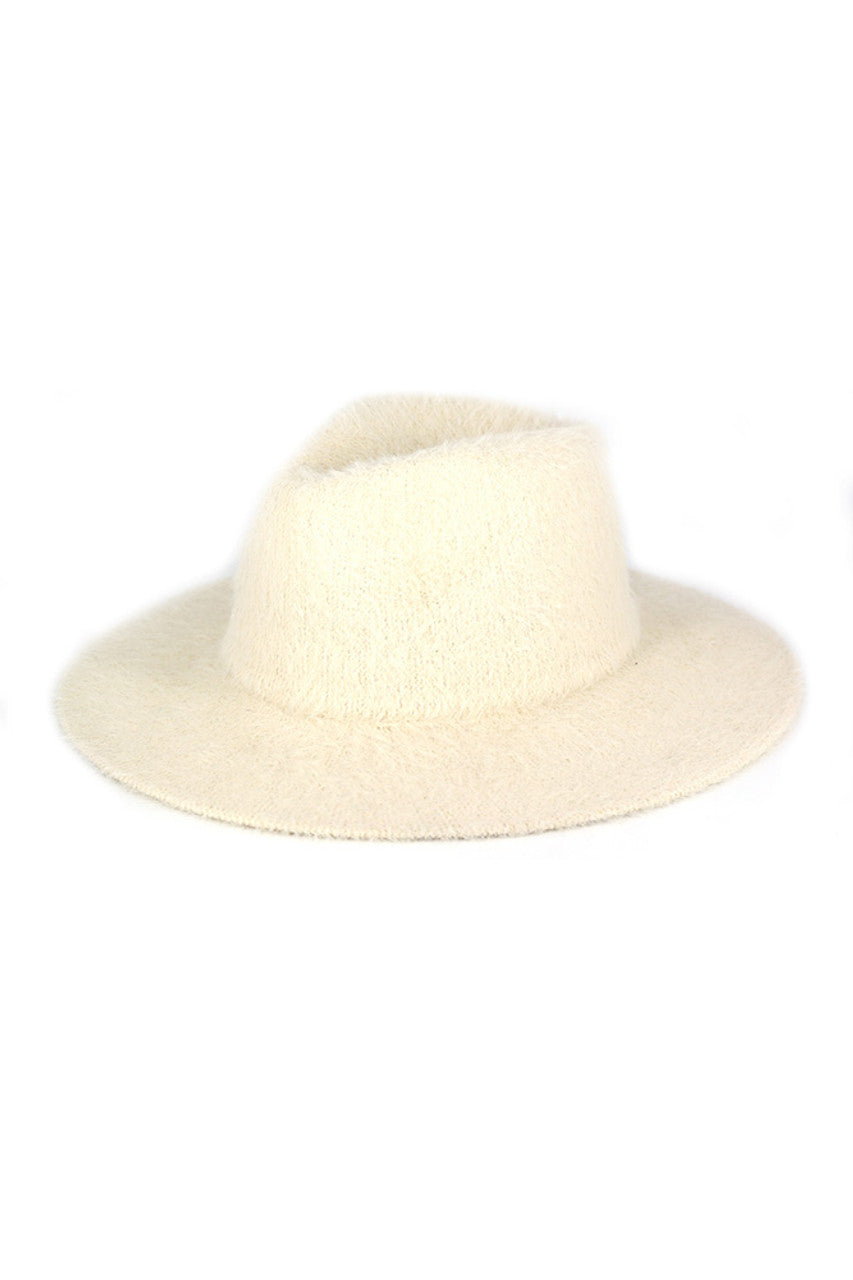 Ivory Fuzzy Palin Solid Winter Fedora Hat merges classic silhouette with cold-weather functionality. Constructed with premium insulating materials, this fedora maintains structural integrity while providing superior warmth. The textured exterior offers both thermal protection and sophisticated styling, while the traditional brim provides practical shielding from winter elements. Designed for discerning individuals who refuse to compromise style for seasonal practicality.