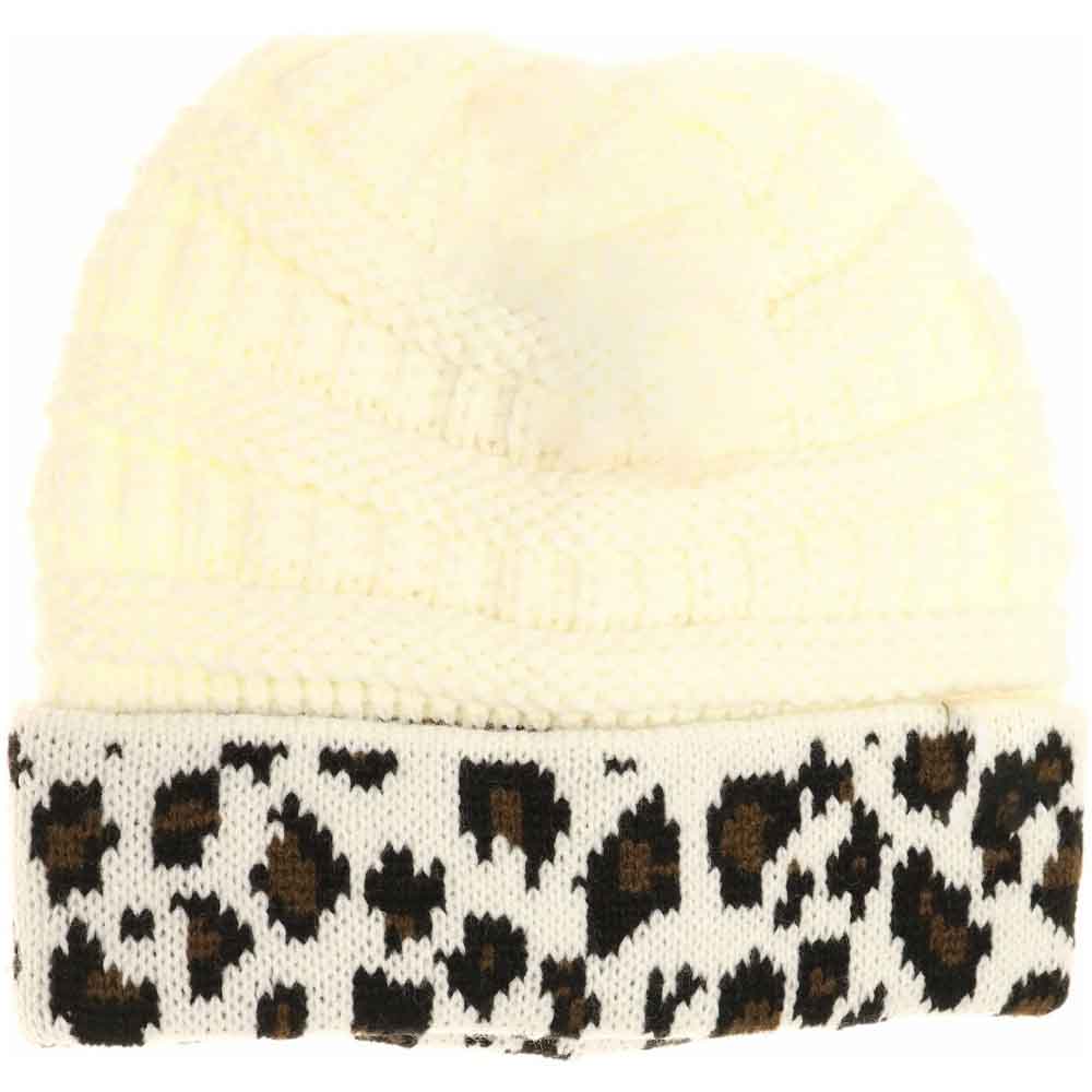 Ivory Kids Matching Cuff Leopard Print CC Beanie combines playful style with cozy warmth. Crafted from a soft knit fabric, this piece features a trendy leopard print pattern and a folded cuff accented by the classic CC logo. Ideal for chilly days, it keeps little heads comfortable while adding a fashionable touch to any outfit. Perfect for matching with adult styles, this beanie offers both practicality and a chic edge for young fashion enthusiasts. 