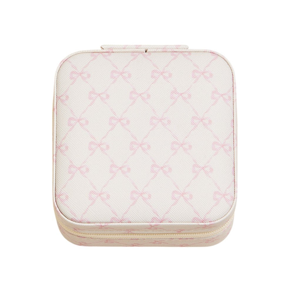 Ivory Pink Bow Pattern Portable Square Jewelry Box is perfect for storing and organising your precious jewellery. The elegant pink bow pattern adds a touch of style, making it a great addition to your dressing table or as a gift. Its compact size makes it ideal for travelling.