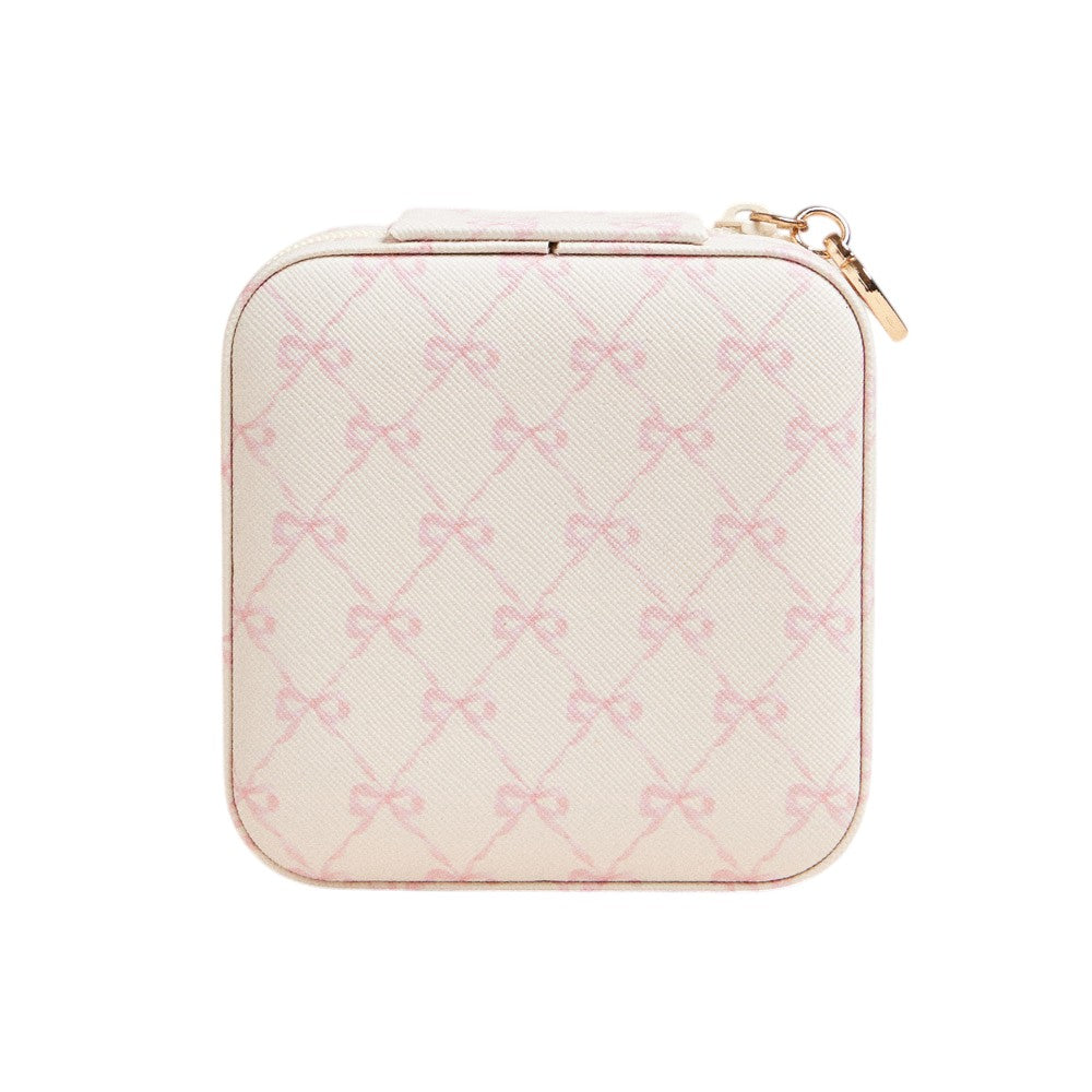 Ivory Pink Bow Pattern Portable Square Jewelry Box is perfect for storing and organising your precious jewellery. The elegant pink bow pattern adds a touch of style, making it a great addition to your dressing table or as a gift. Its compact size makes it ideal for travelling.