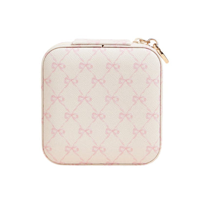 Ivory Pink Bow Pattern Portable Square Jewelry Box is perfect for storing and organising your precious jewellery. The elegant pink bow pattern adds a touch of style, making it a great addition to your dressing table or as a gift. Its compact size makes it ideal for travelling.