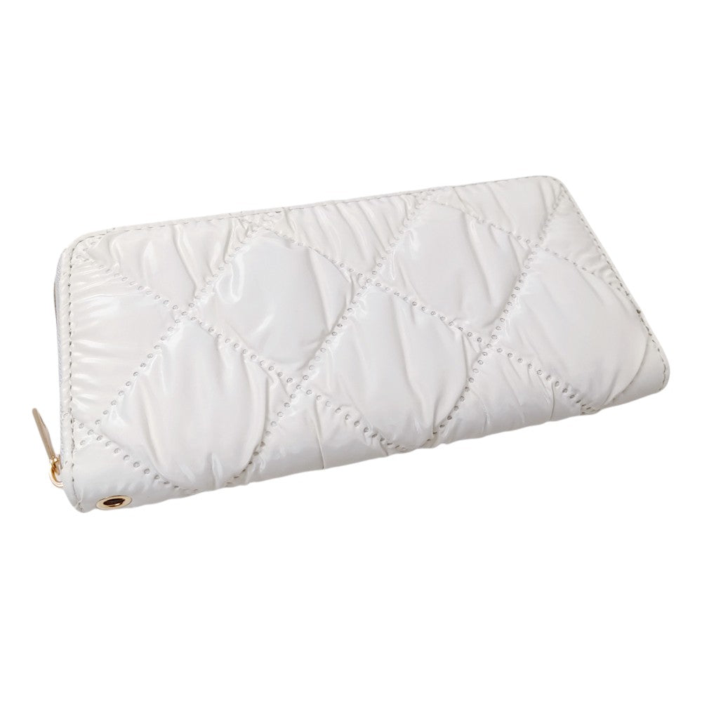 Ivory Shiny Faux Leather Padded Wallet with Wristlet offers a sleek and stylish solution for storing your essentials. Its shiny faux leather material adds a touch of sophistication, while the padded design keeps your valuables safe. The attached wristlet also provides convenience and hands-free carrying. 