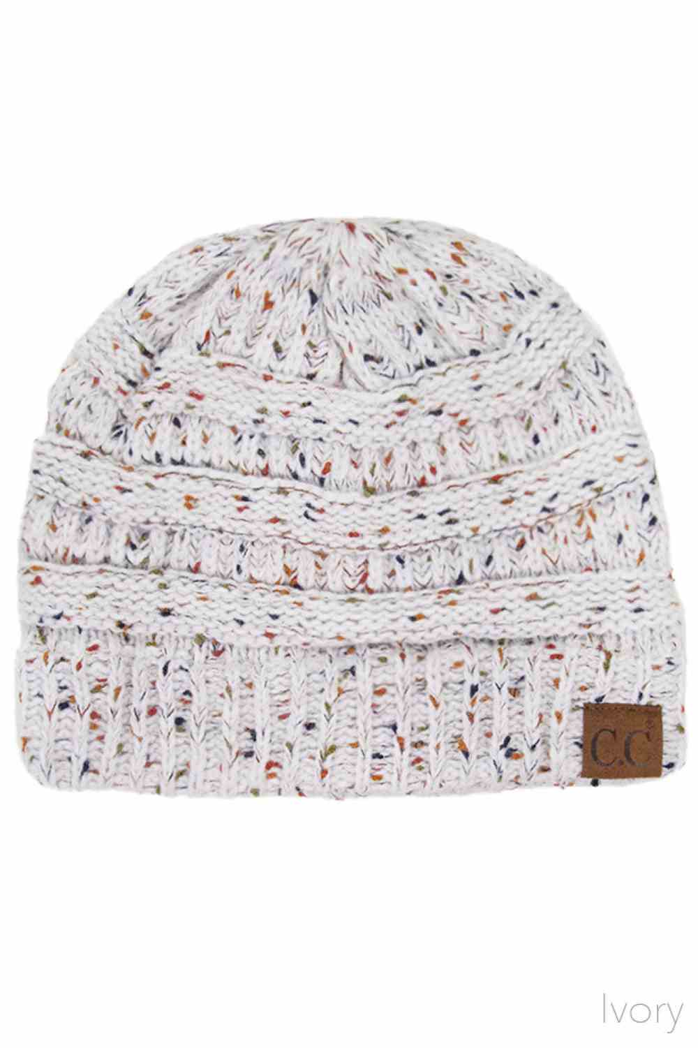 Ivory Stay warm with timeless style in this C.C Confetti Cable Knit Beanie. Crafted from 100% soft acrylic, the classic cable knit texture provides excellent insulation while maintaining breathability for all-day comfort. The playful confetti detailing adds visual interest to this versatile essential. Lightweight yet durable, this beanie transitions seamlessly from casual outings to outdoor adventures, making it a reliable choice for any season.