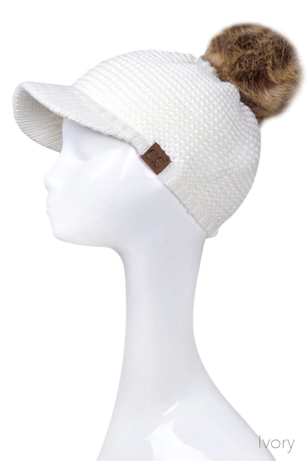 Ivory Elevate your winter wardrobe with this versatile C.C knit brim beanie, crafted from 100% soft acrylic for exceptional comfort and durability. The signature knitted brim design pairs beautifully with a plush fur pom pom, adding a touch of sophistication to any cold-weather look. One size fits most, making it an effortless accessory choice for anyone seeking warmth without compromising on style. Perfect for layering or standalone wear, this beanie delivers both functionality and fashion