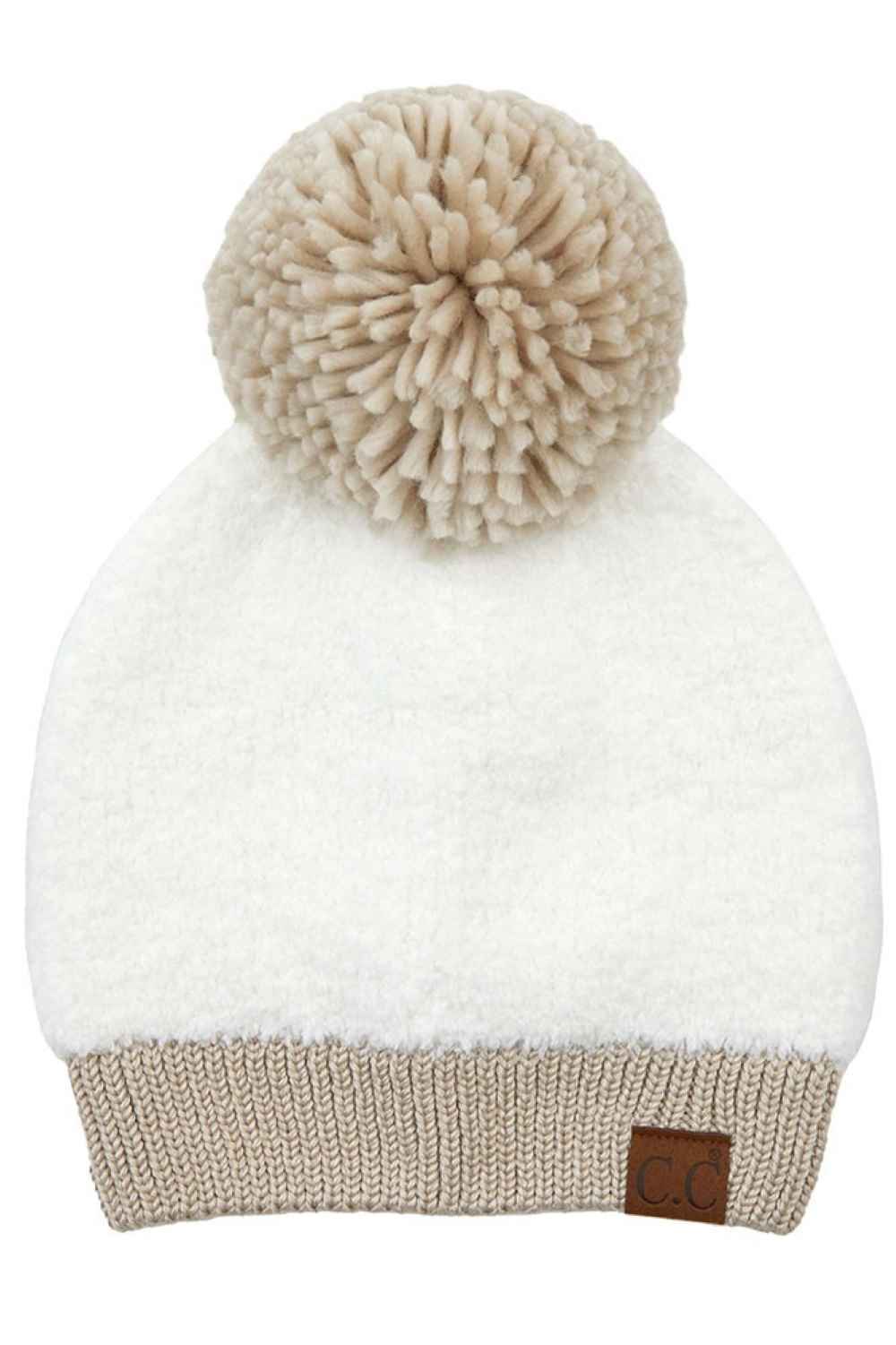Ivory Stay warm and stylish with this C.C Knitted Sherpa Beanie, designed with a soft sherpa lining and contrasting color accents. The cozy knit construction combines 50% acrylic and 50% polyester for durability and comfort through chilly seasons.