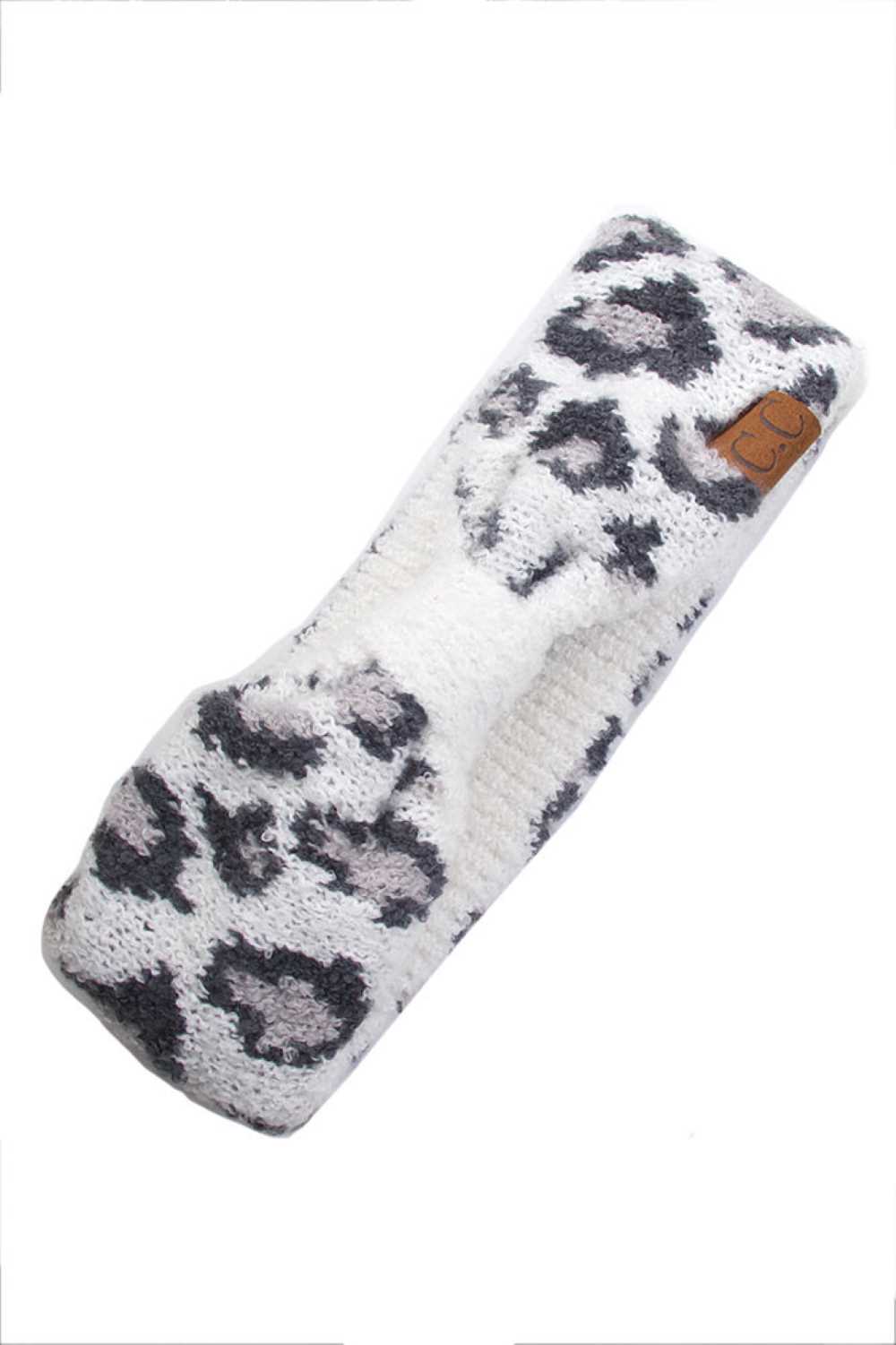 Ivory Elevate your everyday style with the C.C Leopard Jacquard Knit Headwrap. Crafted from 100% acrylic, this versatile headwrap features a striking leopard jacquard pattern that adds dimension and visual interest. One size fits most, making it the perfect accessory for any occasion—whether you're running errands, hitting the gym, or making a fashion statement. Made in China with quality craftsmanship you can trust. Comfortable, durable, and effortlessly chic.