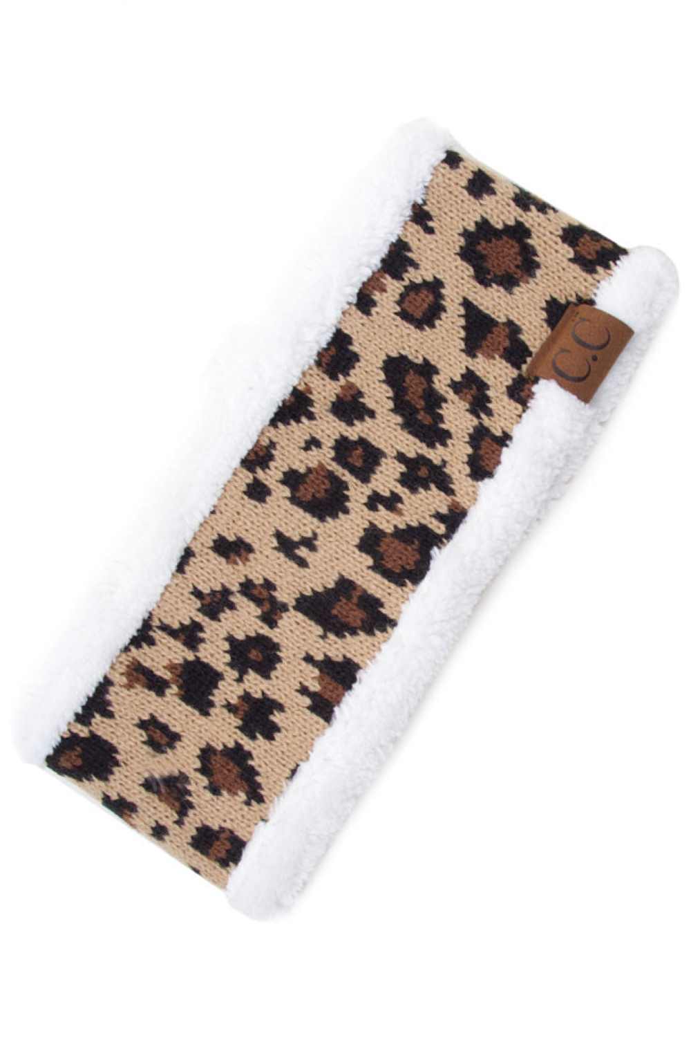 Ivory Stay warm and stylish with this cozy C.C Leopard Knitted Headwrap, featuring a soft sherpa lining inside for extra comfort. The classic leopard print adds a trendy touch to any winter outfit. Crafted from 100% acrylic, this one-size-fits-most headwrap is perfect for keeping your ears protected during cold weather while maintaining your fashion-forward look. Lightweight and easy to wear, it's an essential accessory for the season.
