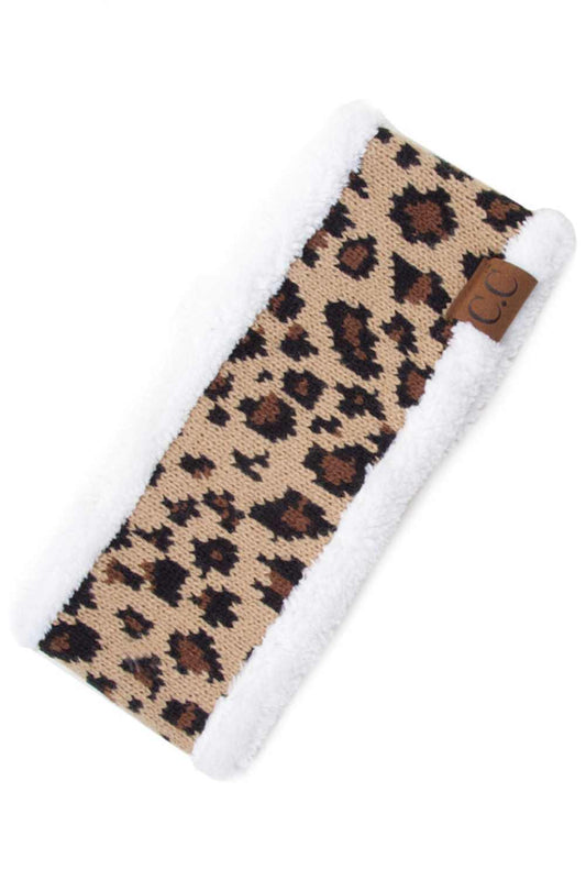 Ivory Stay warm and stylish with this cozy C.C Leopard Knitted Headwrap, featuring a soft sherpa lining inside for extra comfort. The classic leopard print adds a trendy touch to any winter outfit. Crafted from 100% acrylic, this one-size-fits-most headwrap is perfect for keeping your ears protected during cold weather while maintaining your fashion-forward look. Lightweight and easy to wear, it's an essential accessory for the season.